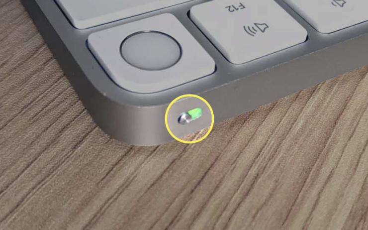 Apple Magic Keyboard with TouchID showing the power button on the leading edge